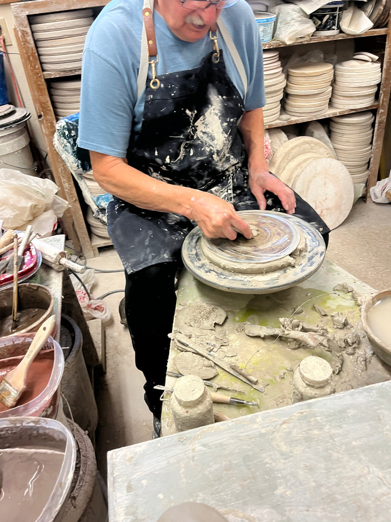 John Demonstrates throwing a crock on his potters wheel